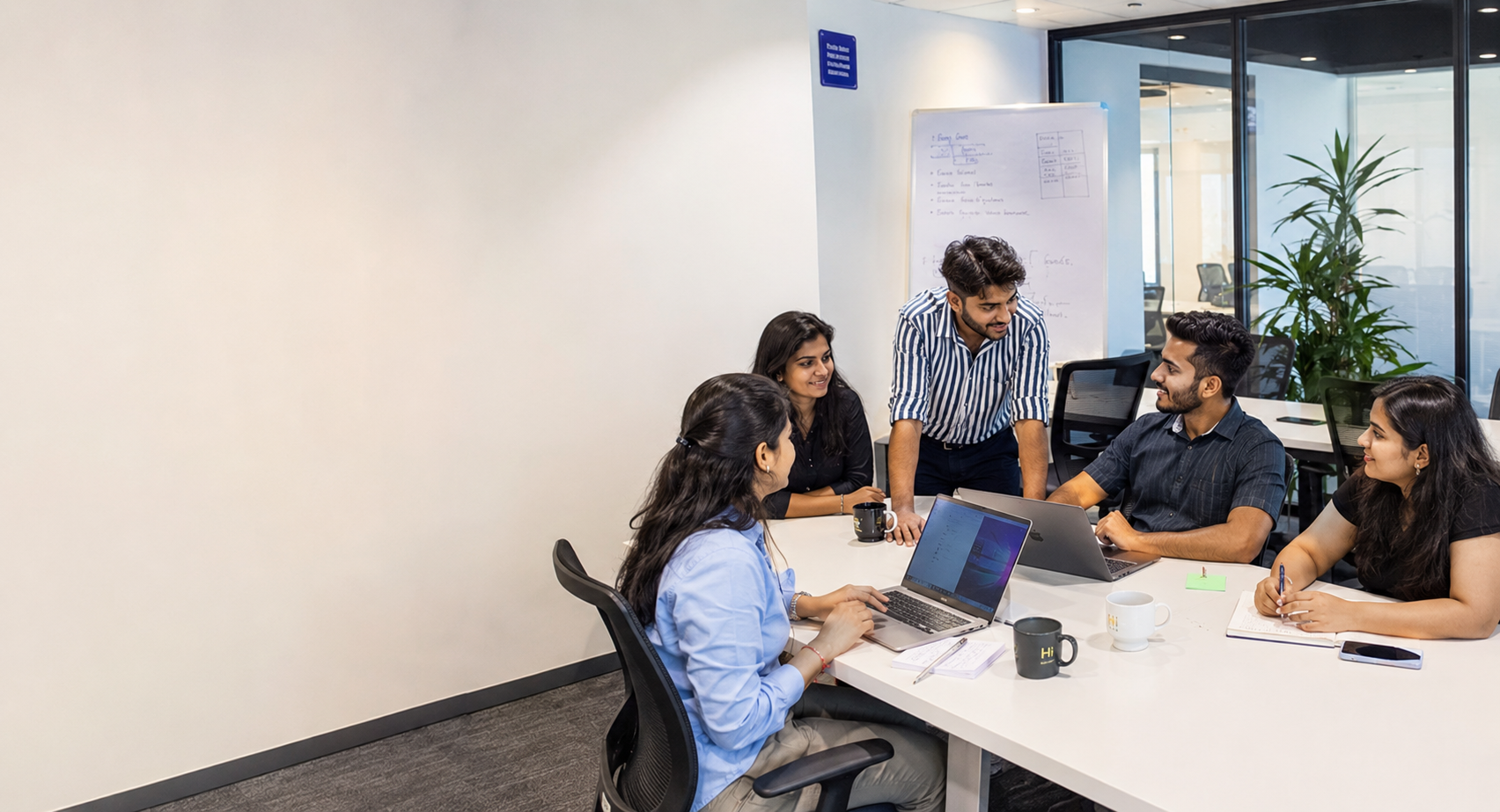 SEO strategy session with team reviewing analytics dashboard